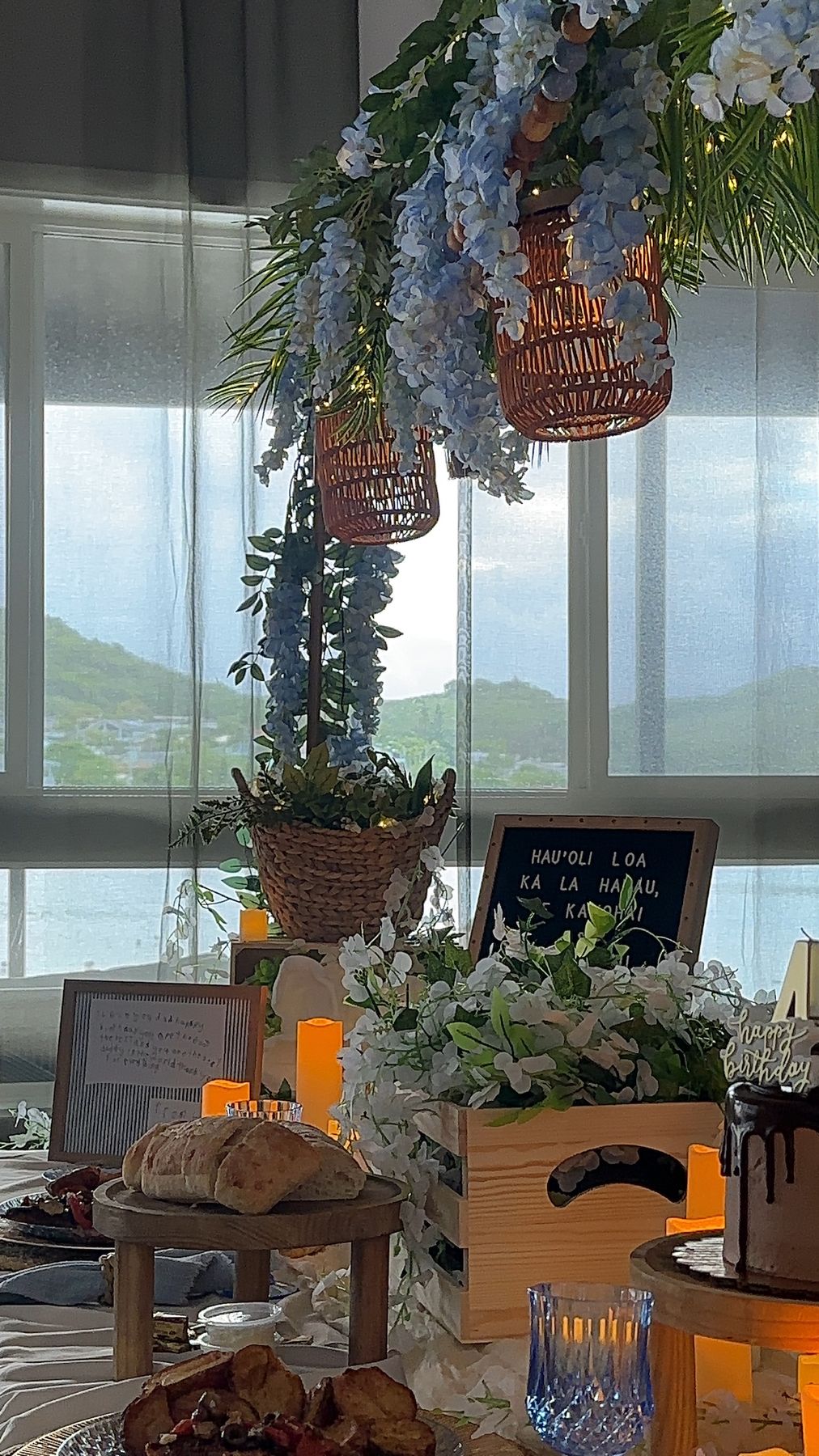 Hanging florals and lanterns above the dinner tablescape