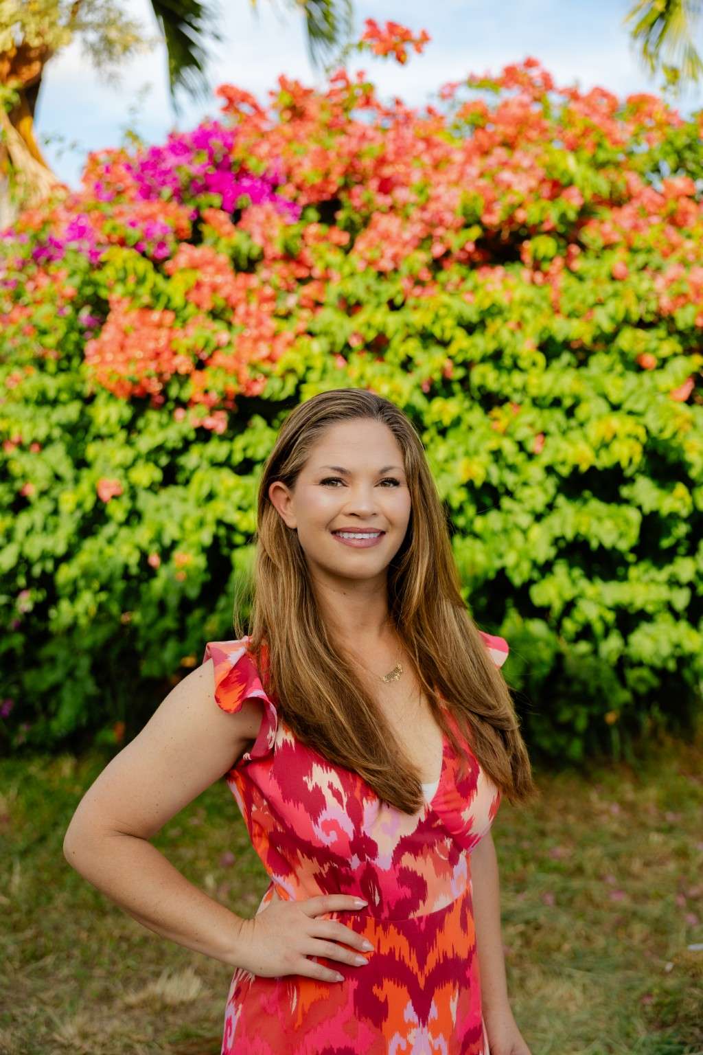 Hauʻolilani Hiers, founder of Weddings By Hauʻoli, in a tropical garden on Oʻahu